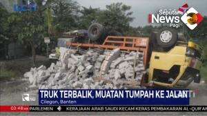 Tak Kuat Menanjak, Truk Terbalik