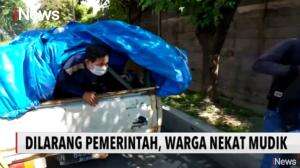 Pemudik Kelabui Petugas Dengan Naik Truk Towing