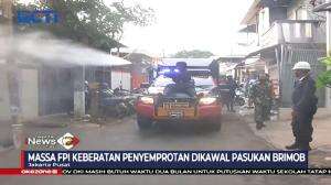 Polda Metro Jaya Melakukan Penyemprotan Disinfektan Di Kawasan Petamburan, Jakarta Pusat