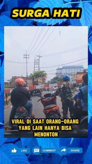 Bapak TNI ini sampai turun dari motornya, demi selamatkan motor pengangkut sampah yang tampak tersangkut di rel kereta api..