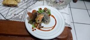 Salmon En Croute with Mushroom Sc, Green Honey Salad, Tomato paste & Crispy Salmon Skin