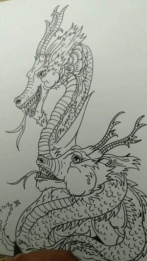 Menggambar Dua Naga Emas Bercinta