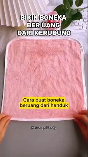 boneka beruang dari kerudung