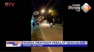 Warga Menyiram Air Ke Pembalap