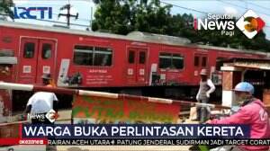 Warga Buka Paksa Pintu Perlintasan Kereta Api