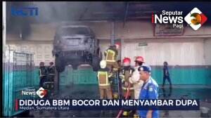 Mobil Terbakar Di atas Hidrolik