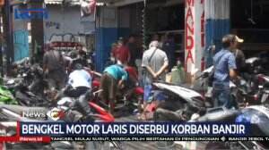 Bengkel Motor Laris Diserbu Korban Banjir