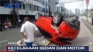 Sedan Terguling, Dua Orang Terluka