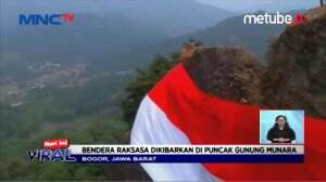 Bendera Raksasa Di Puncak Gunung