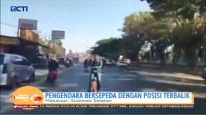 Kocak! Aksi Iseng Pria Bersepeda Terbalik