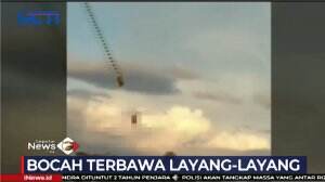 Anak 13 Tahun Terbang Terbawa Layang - Layang