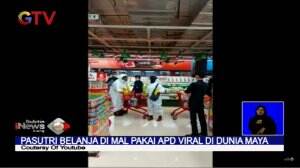 Pasutri Buat Heboh Berbelanja Menggunakan APD Ke Pasar Swalayan