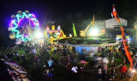 In Picture: Wahana Hiburan Pasar Malam, Hiburan Alternatif Warga Saat Liburan