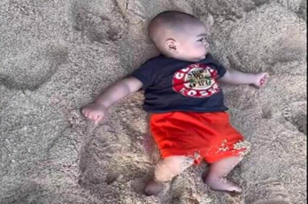Raffi Unggah Video Rayyanza Tiduran di Pasir, Netizen: Duit Lagi Berbaring