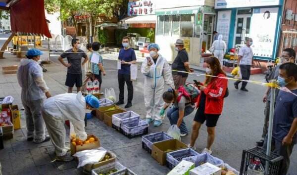 Xinjiang Longgarkan Sebagian Pembatasan Covid-19 Setelah Peristiwa Kebakaran