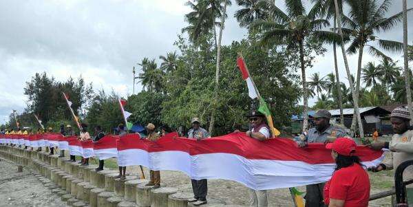 Kobarkan Nasionalisme, Warga Papua Bentangkan Bendera Raksasa 1.000 Meter Kobarkan Nasionalisme, Warga Papua Bentangkan Bendera Raksasa 1.000 Meter