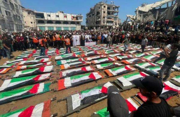 Prosesi Pemakaman Terbesar, Ribuan Warga Gaza Salatkan 112 Jenazah Korban Kebrutalan Israel Prosesi Pemakaman Terbesar, Ribuan Warga Gaza Salatkan 112 Jenazah Korban Kebrutalan Israel