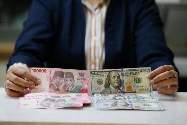 BI Ungkap Penyebab Rupiah Melemah Dekati Rp18.000 per Dolar AS BI Ungkap Penyebab Rupiah Melemah Dekati Rp18.000 per Dolar AS