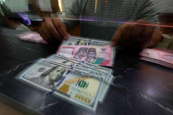 Rupiah Ditutup Kembali Menguat ke Rp17.897 per Dolar AS, Ini Faktor Pendorongnya Rupiah Ditutup Kembali Menguat ke Rp17.897 per Dolar AS, Ini Faktor Pendorongnya