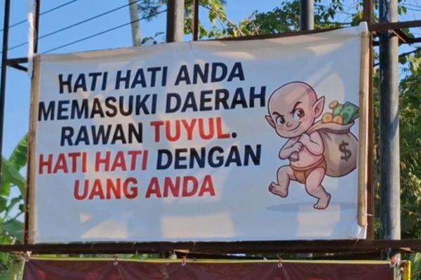 Gara-Gara Uang Kerap Hilang Misterius, Warga Jember Pasang Spanduk Rawan Tuyul Gara-Gara Uang Kerap Hilang Misterius, Warga Jember Pasang Spanduk Rawan Tuyul