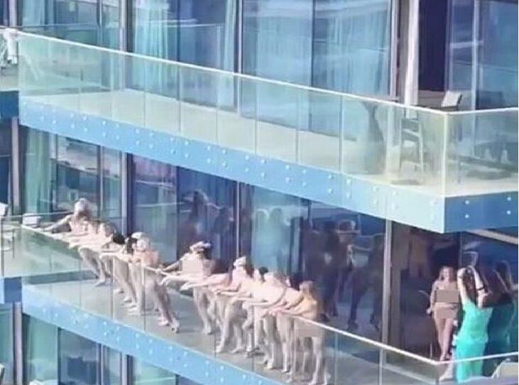 Polisi Tangkap Sekelompok Wanita Tanpa Busana di Balkon Penthouse