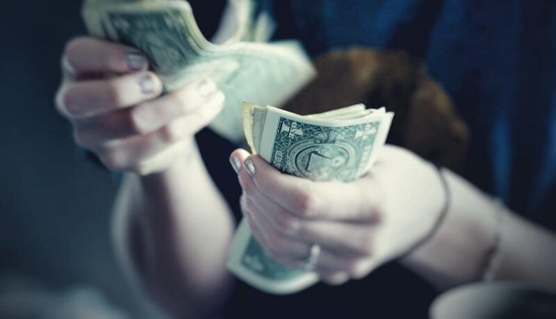 Dolar AS Melemah Sikapi Kebijakan Bank Sentral Kanada