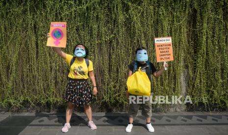 In Picture: Aksi Hari Bumi Digelar di Kawasan Bundaran HI