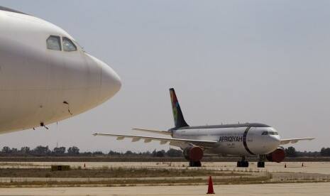 Vakum 7 Tahun, Penerbangan Pertama Libya Mendarat di Kairo