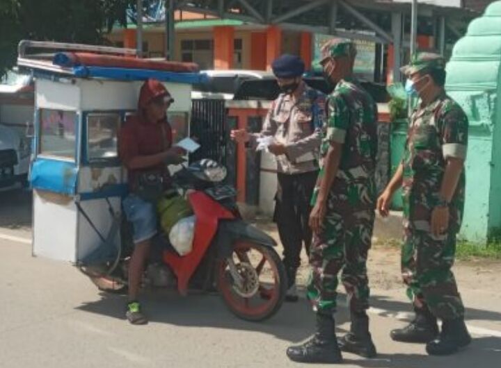 Antisipasi Covid-19 Varian Baru, Satbrimob Polda Banten dan TNI Kompak Imbau Warga Disiplin Prokes
